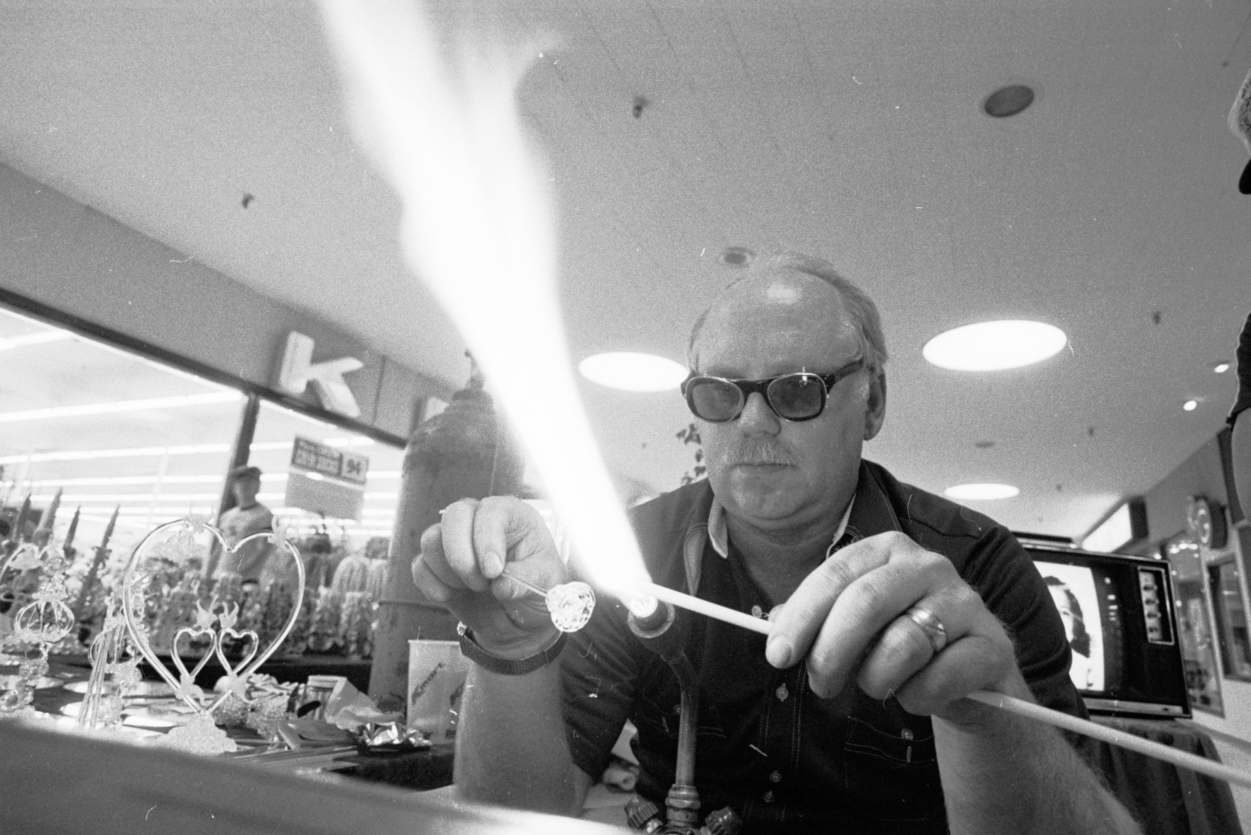 Glass sculptor at West Park Plaza, 1982
